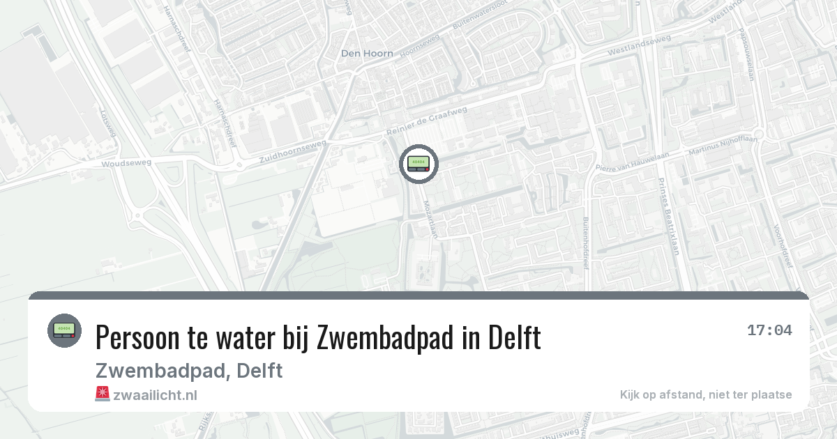 Persoon te water bij Zwembadpad in Delft — 10 feb 2026